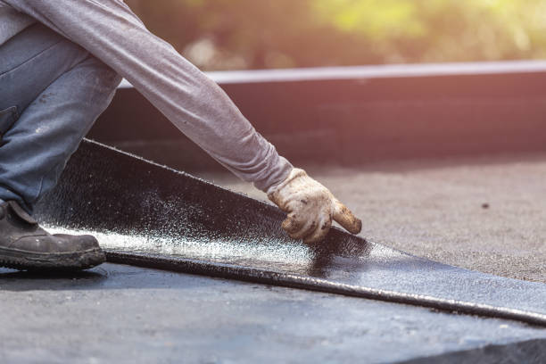 Professional Waterproofing technician working in Petersburg, KY